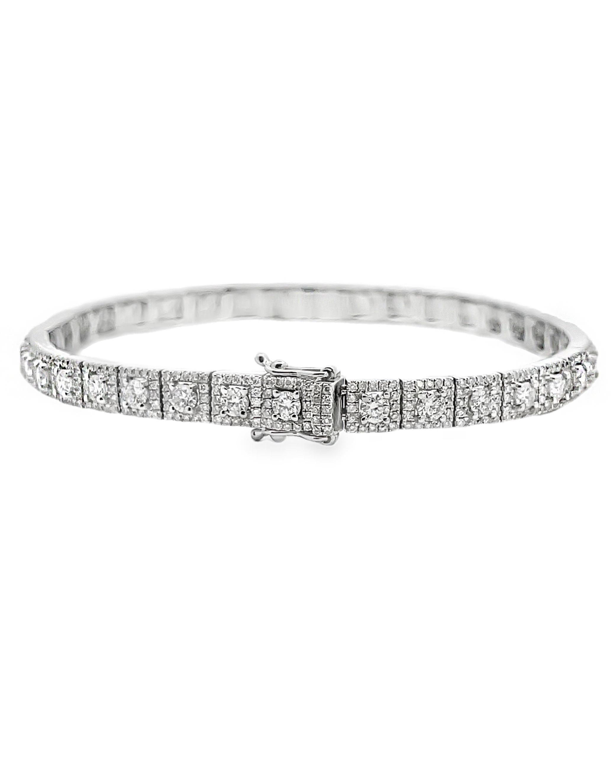 18K white gold antique inspired tennis bracelet with 605 round faceted diamonds weighing 4.48 carats total.