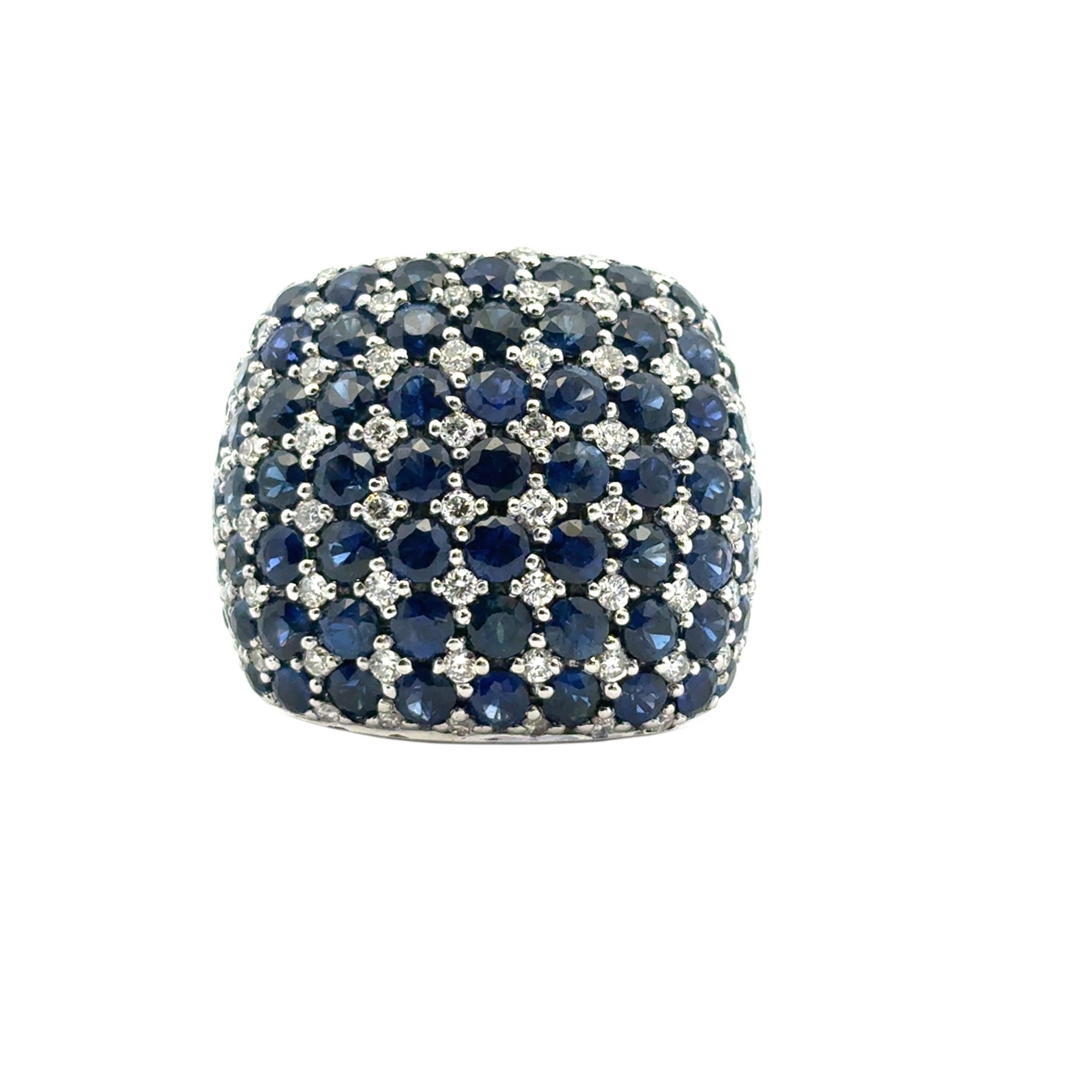 Anillo en cúpula de oro blanco de 18 quilates de aproximadamente 4,94 quilates de zafiros azules redondos y 0,72 quilates de diamantes redondos naturales

¡Este impresionante Anillo Cúpula Zafiro Diamante está en excelentes condiciones y listo para