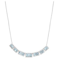 18K White Gold Aquamarine & Natural Diamond Halo Necklace.