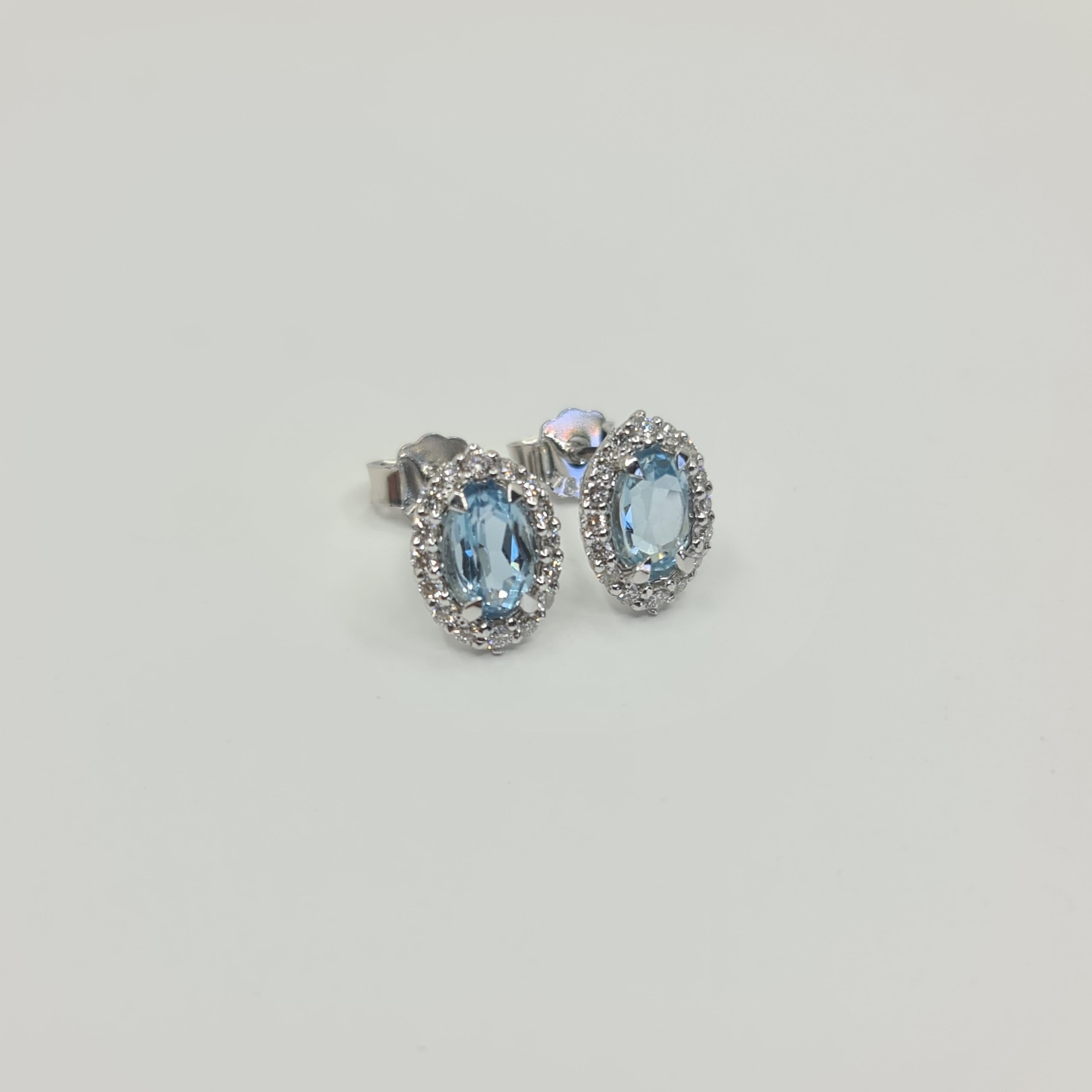 Oval Cut 18K White Gold Aquamarine Studs 0.84 Carat with Diamond Halo 0.29 Carat F/VS For Sale