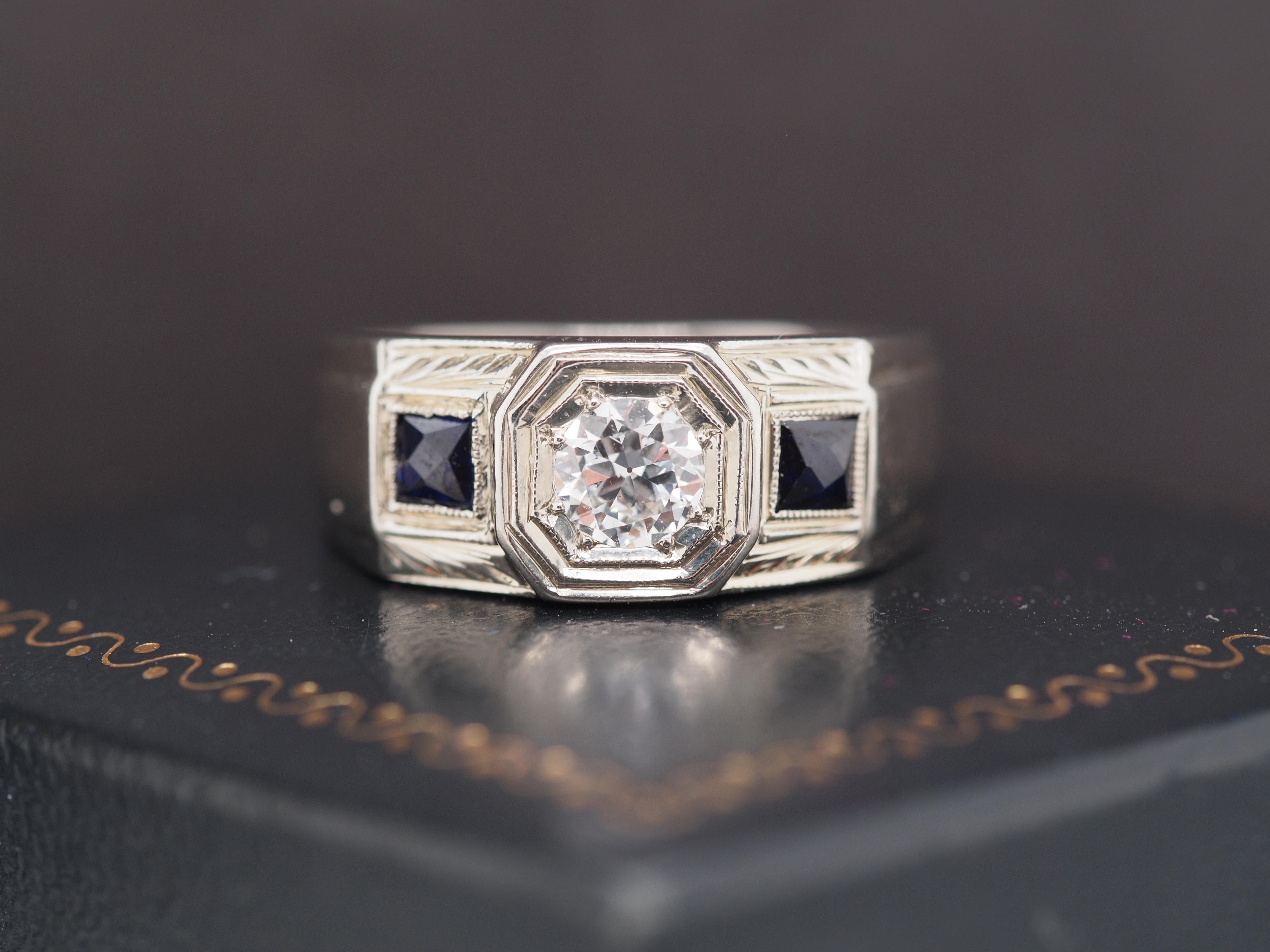 Year: 1940s
Item Details:
Ring Size: 7
Metal Type: 18K White Gold [Hallmarked, and Tested]
Weight: 7.8 grams
Diamond Details
Center Diamond: .38ct, Old European Brilliant, F Color, VS Clarity, Natural Diamond
Side Sapphires: French Cut, Natural,