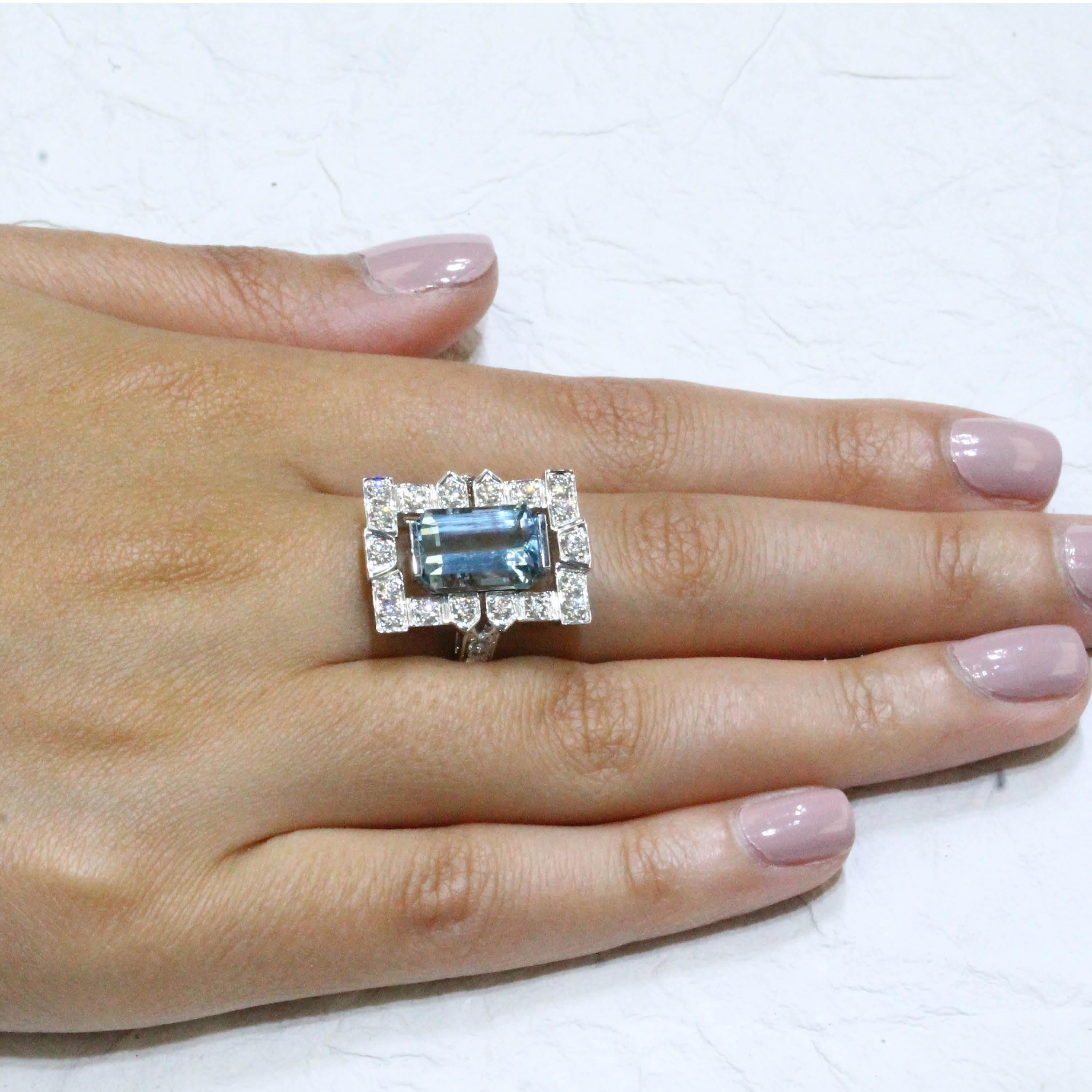 18K White Gold Ring Featuring an Emerald-Cut 4.29 carat Aquamarine, accented by Round Diamonds. Finger size 6.5, adjustable upon request/quote. Aquamarine evokes the purity of crystalline waters, and the exhilaration and relaxation of the sea. Item