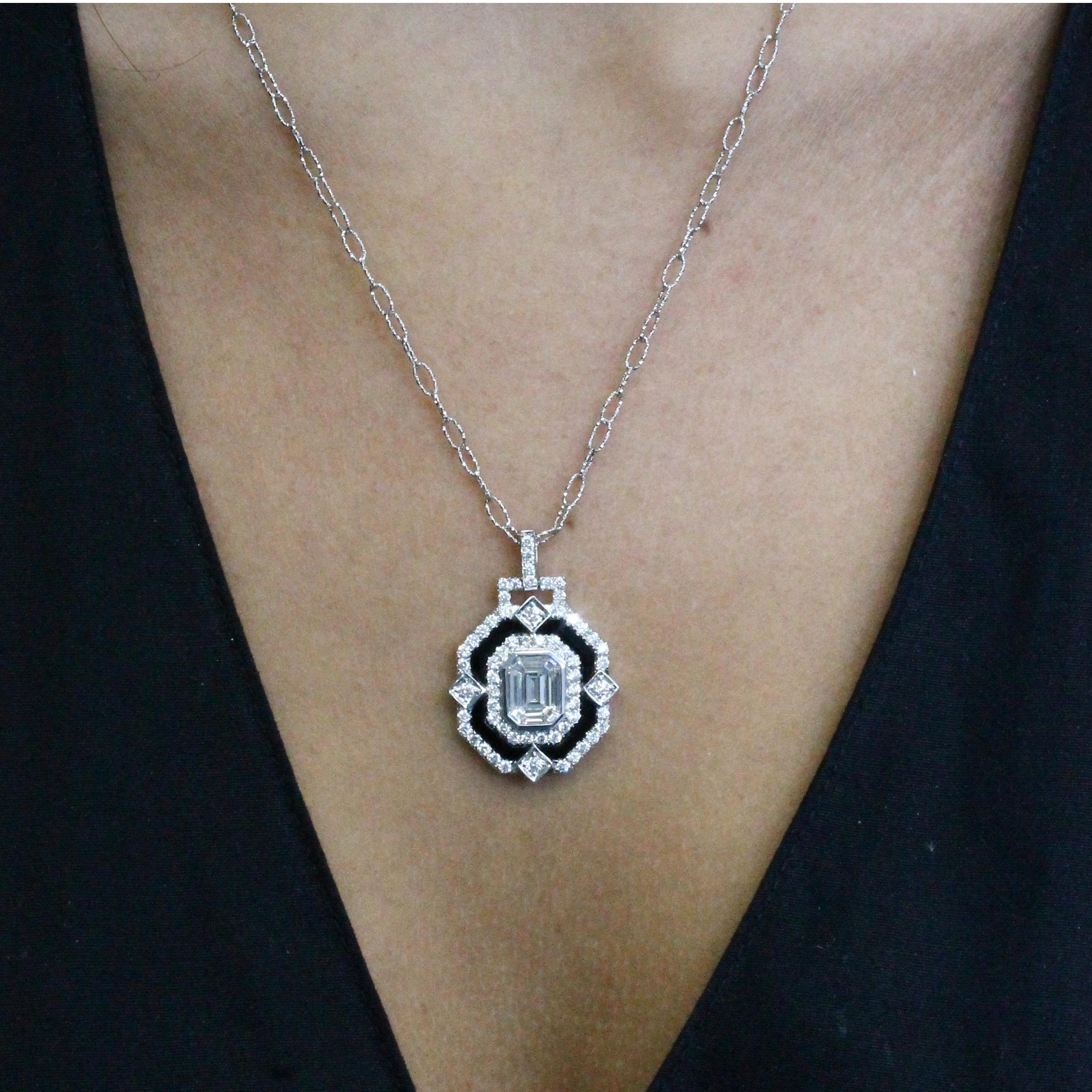 One-of-a-Kind Necklace featuring an Invisible-Set Emerald Diamond Center made up of Baguettes, framed in Black Onyx, in an 18K White Gold Art-Deco setting, hanging on a Handmade Italian 18-inch Textured Link Chain. Round Diamond Accents. Black Onyx