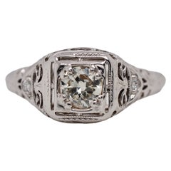 Anillo Art Decó de oro blanco de 18 quilates con diamante redondo de talla brillante modificado