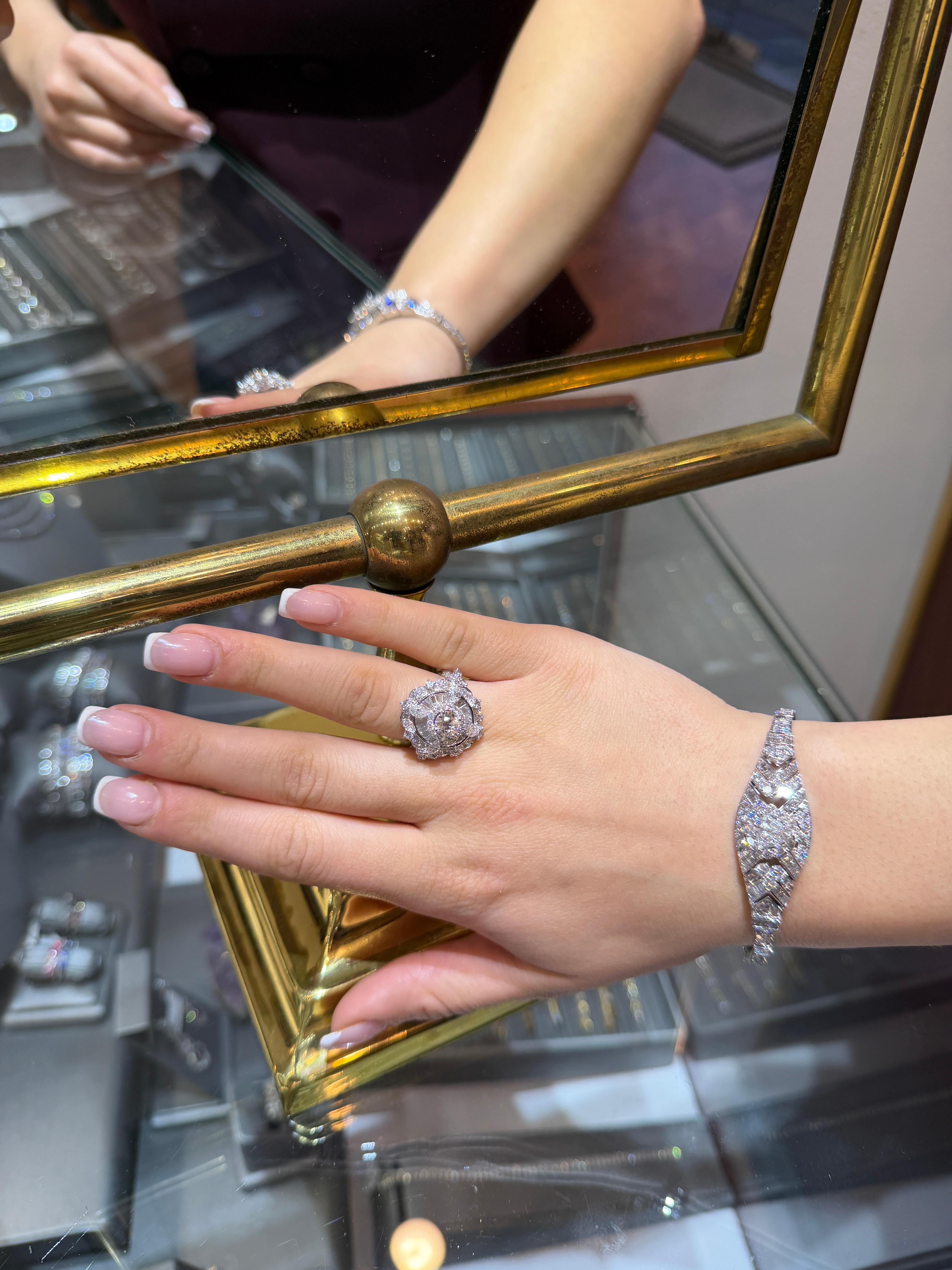 A breathtaking Art Deco–inspired diamond bracelet, crafted in solid 18K white gold and designed with the sleek architectural glamour reminiscent of the 1920's and recurring 1960s diamond glamour era. This piece showcases a rare combination of