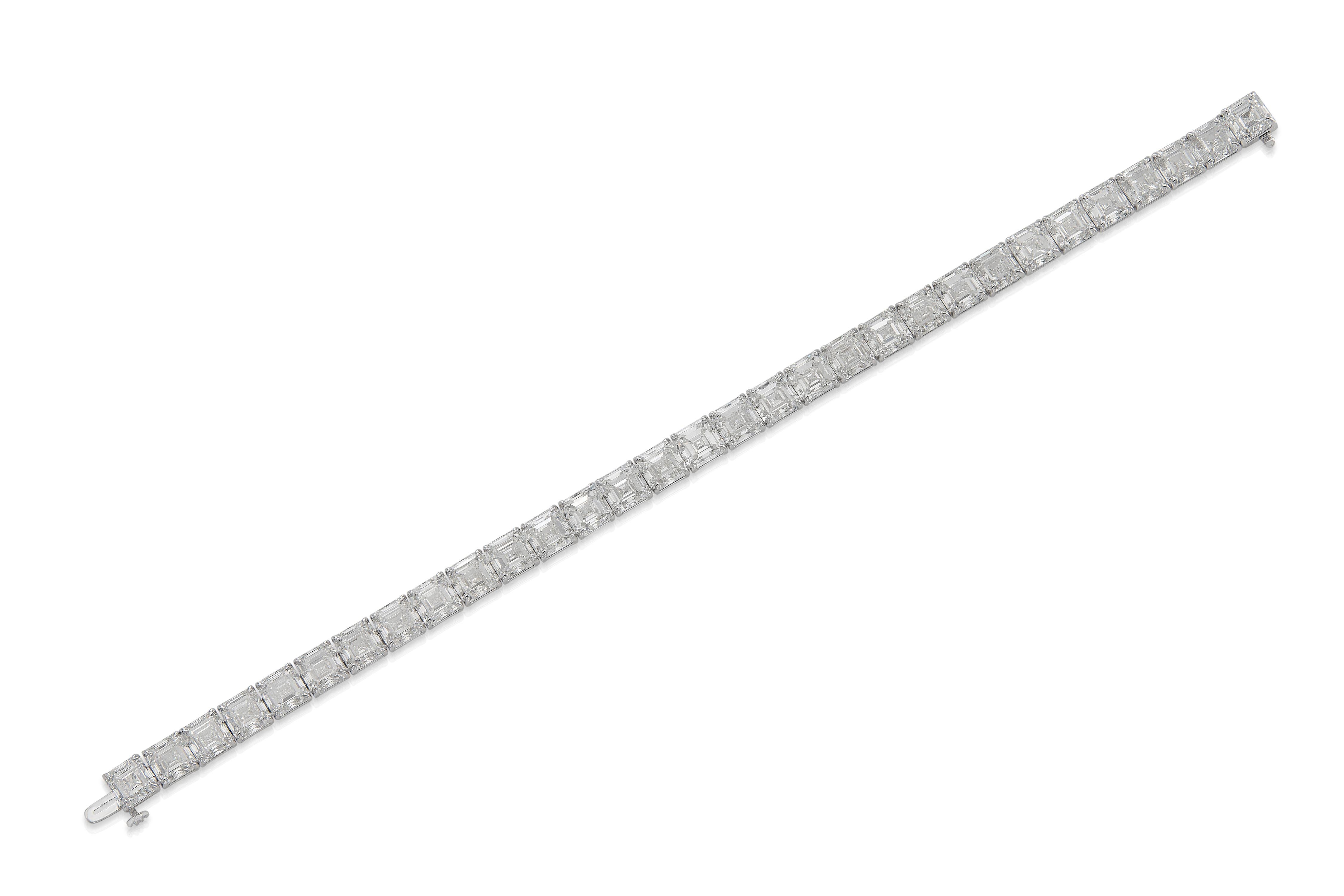 Handmade 18K White Gold Tennis Bracelet set with 31 Asscher Cut Natural Diamonds G-H color VVS-VS clarity weighting a total of 31.03 carat, 7 inches. 