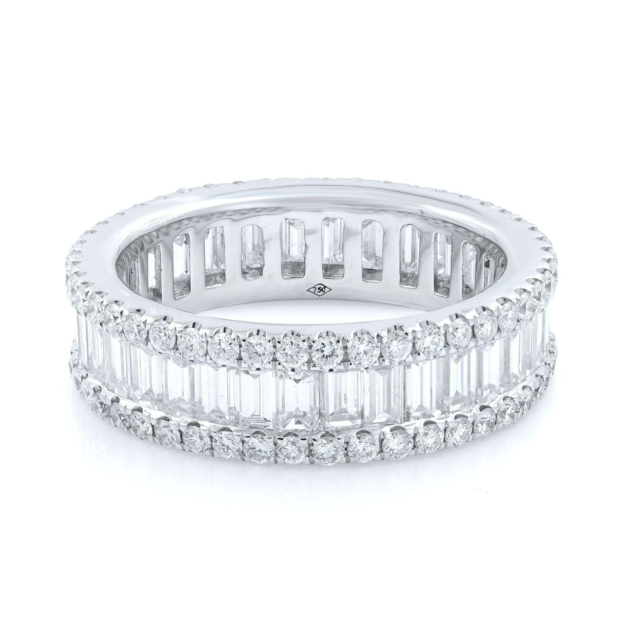 The channel set full eternity was crafted with hand selected baguette cut and round pave cut diamonds weighing 3.44ct in total, beautifully set in 18K white gold. 
Total weight: 4.7
Size: 6.5