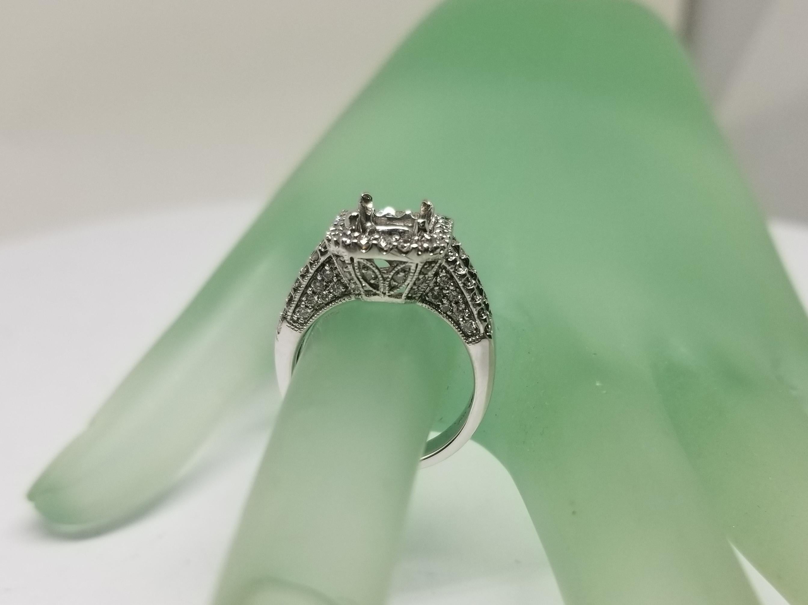18 Karat White Gold Baguette and Round Diamond Halo Ring In Excellent Condition In Los Angeles, CA
