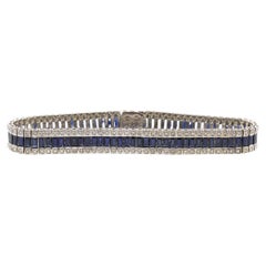 Bracciale in oro bianco 18 carati con zaffiri blu baguette e diamanti