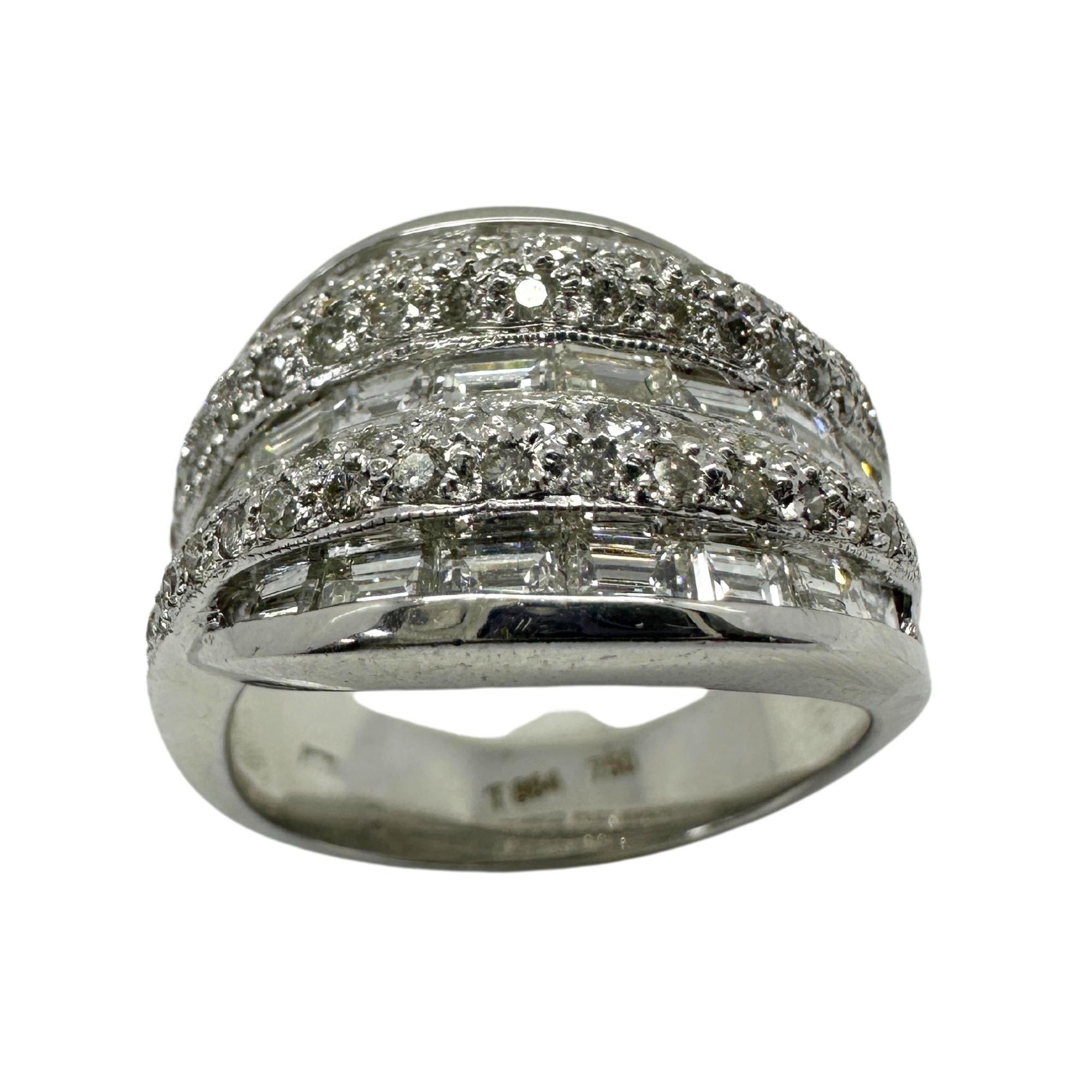 18K White Gold Baguette Cut Diamond Wide Band Ring
Condition: In good condition with some minor surface wear consistent with age.
Ring size: 6.25
Width: 12.8mm wide
Markings: “T864” 