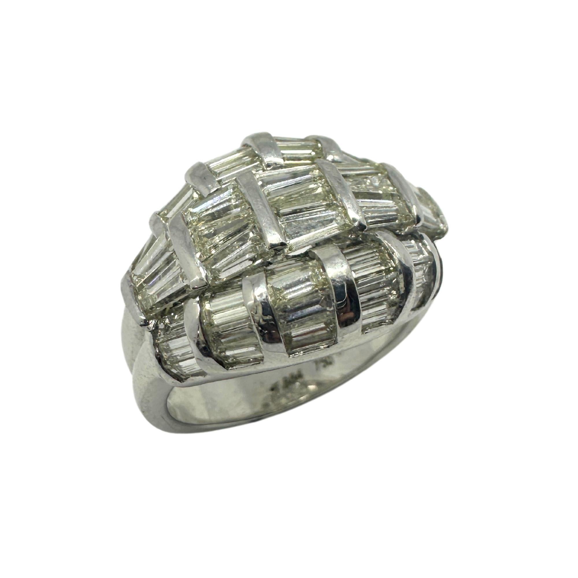 Indulge in luxury with our 18k Diamond Dome Ring. Crafted in shimmering 18k white gold, this stunning piece features a total of 3.58 carats of sparkling diamonds. With a ring size of 6.50, it is the epitome of elegance and sophistication. Its