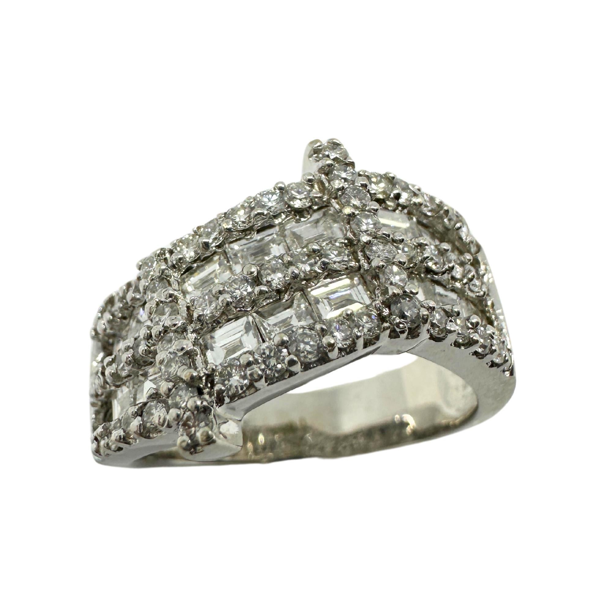18K White Gold Baguette Cut Diamond Wide Band Ring
Condition: In good condition with some minor surface wear consistent with age.
Ring size: 7.50
Width: 8.2mm wide
Markings: “T864” 