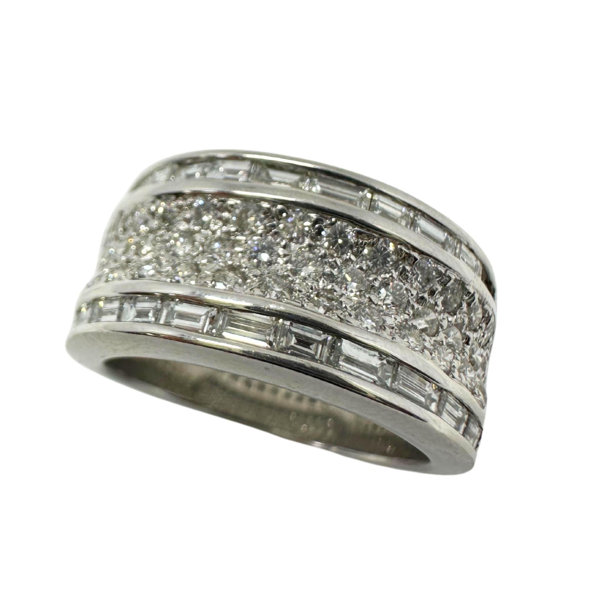 18K White Gold Baguette Cut Diamond Wide Band Ring
Condition: In good condition with some minor surface wear consistent with age.
Ring size: 6
Width: 9.5mm
Metal: 18k White Gold
Weight: 8.5 grams
Baguette Cut Diamonds: 0.88 carats
Diamond Accents: