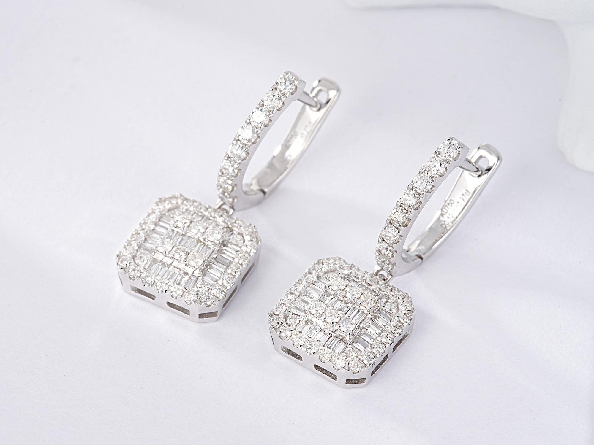  18K White Gold Baguette Diamond Earrings

Baguette Diamonds - 0.26 CT
Round Diamonds - 0.54 CT
Total Weight - 3.66 GM