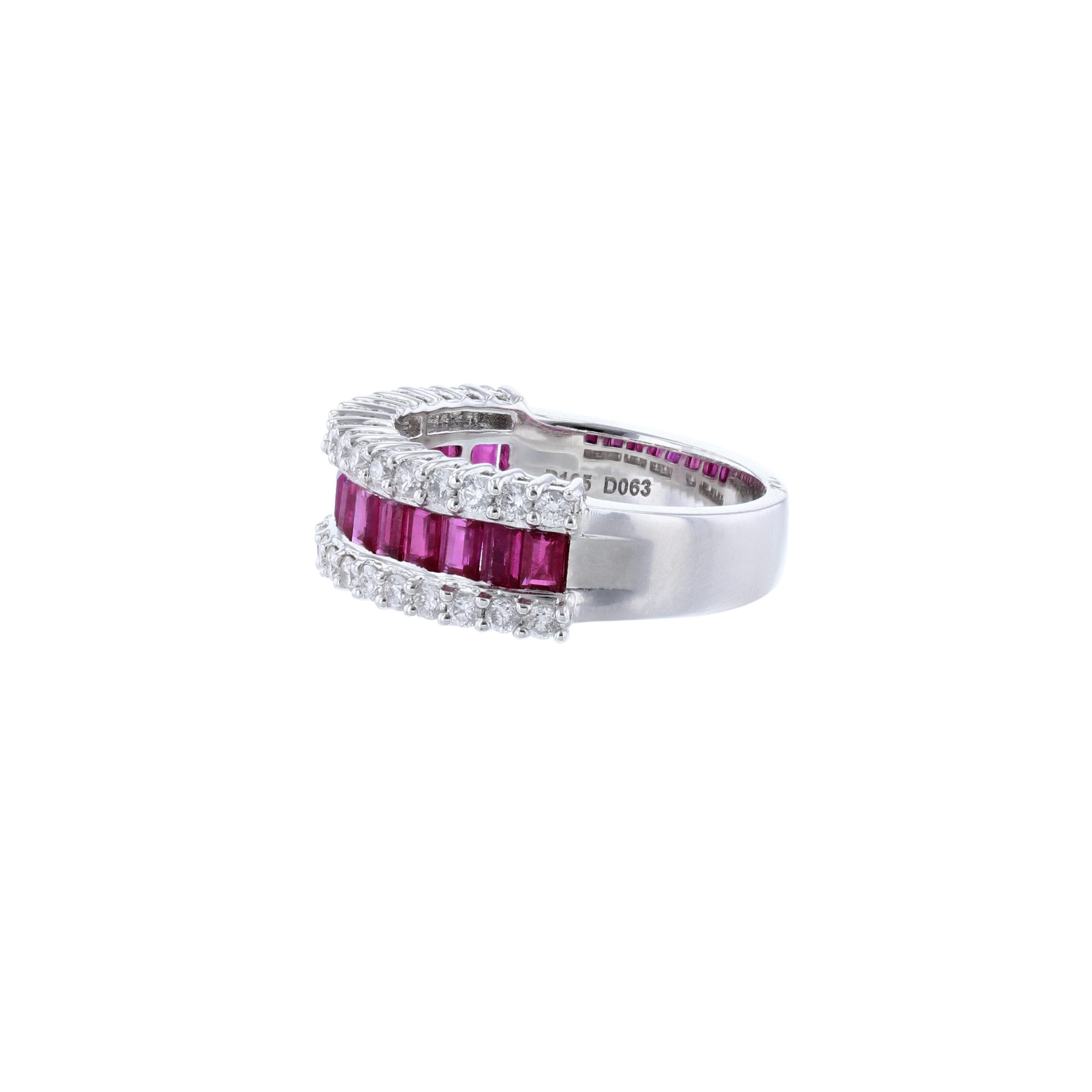 This ring is made in 18k white gold featuring 14 baguette cut, channel set rubies weighing 1.65 carat. Surrounded by 34 round cut, prong set diamonds weighing 0.63 carat. With a color grade (H) and clarity grade (SI1). 