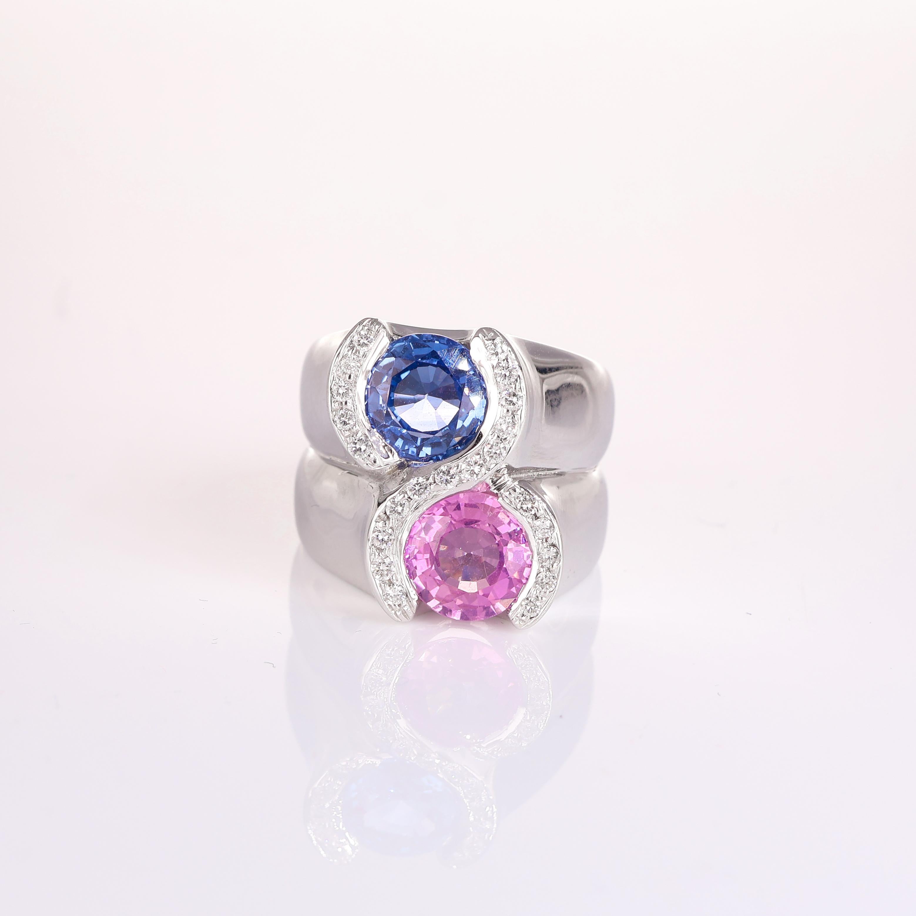 IMPORTANT NOTE:
✔ No additional costs will be added to this order.
✔ Shipping and customs duties are fully covered by us.
--------------------
This elegant 18K white gold band ring showcases two stunning sapphires—one pink and one blue—totaling 2.30