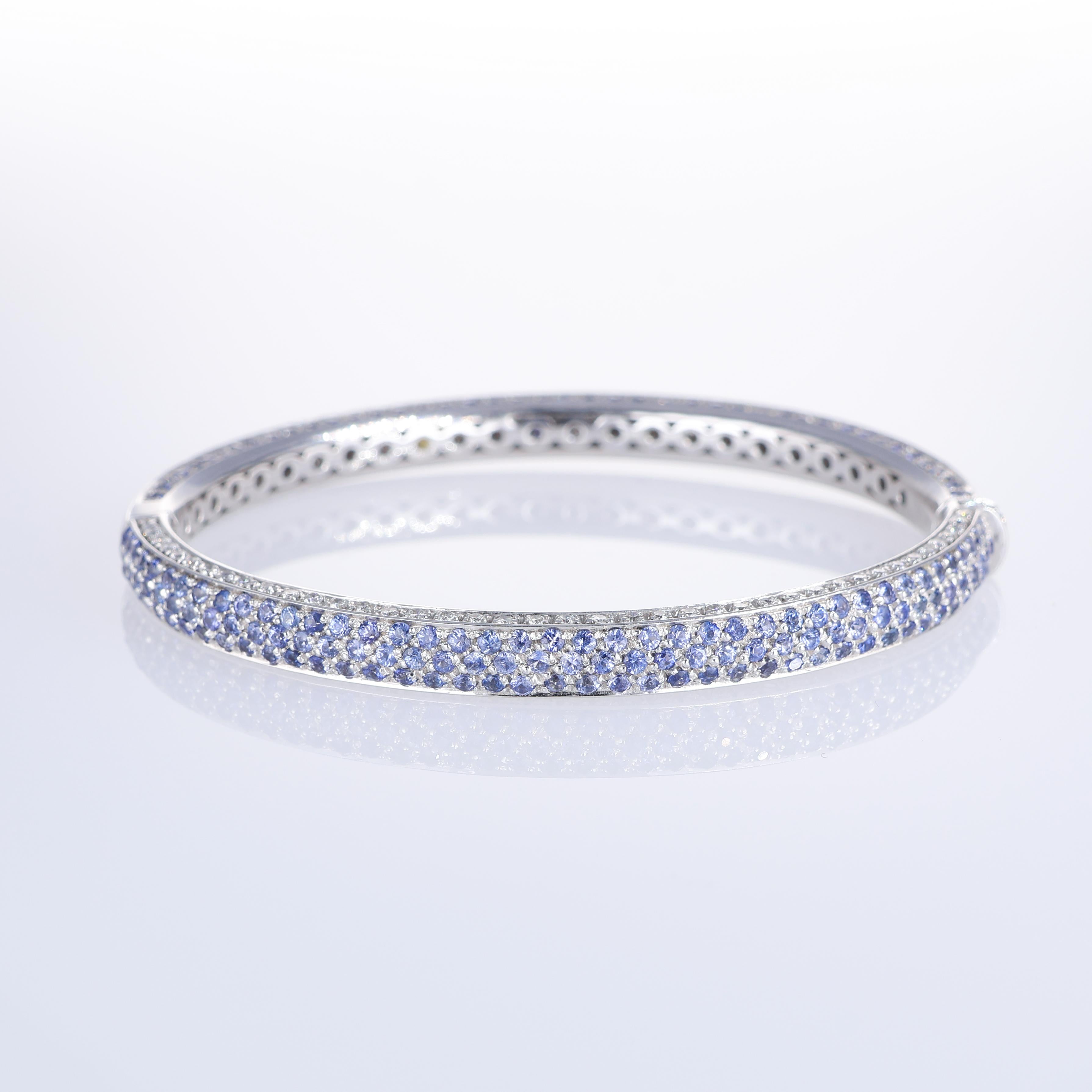 Brilliant Cut 18K White Gold Bangle Bracelet with Diamonds and Blue Sapphires For Sale