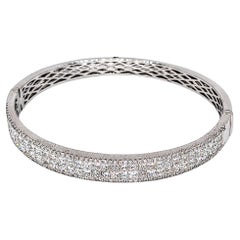 Brazalete de oro blanco de 18 quilates con diamantes talla príncipe y redondos por un total de 6,55 quilates