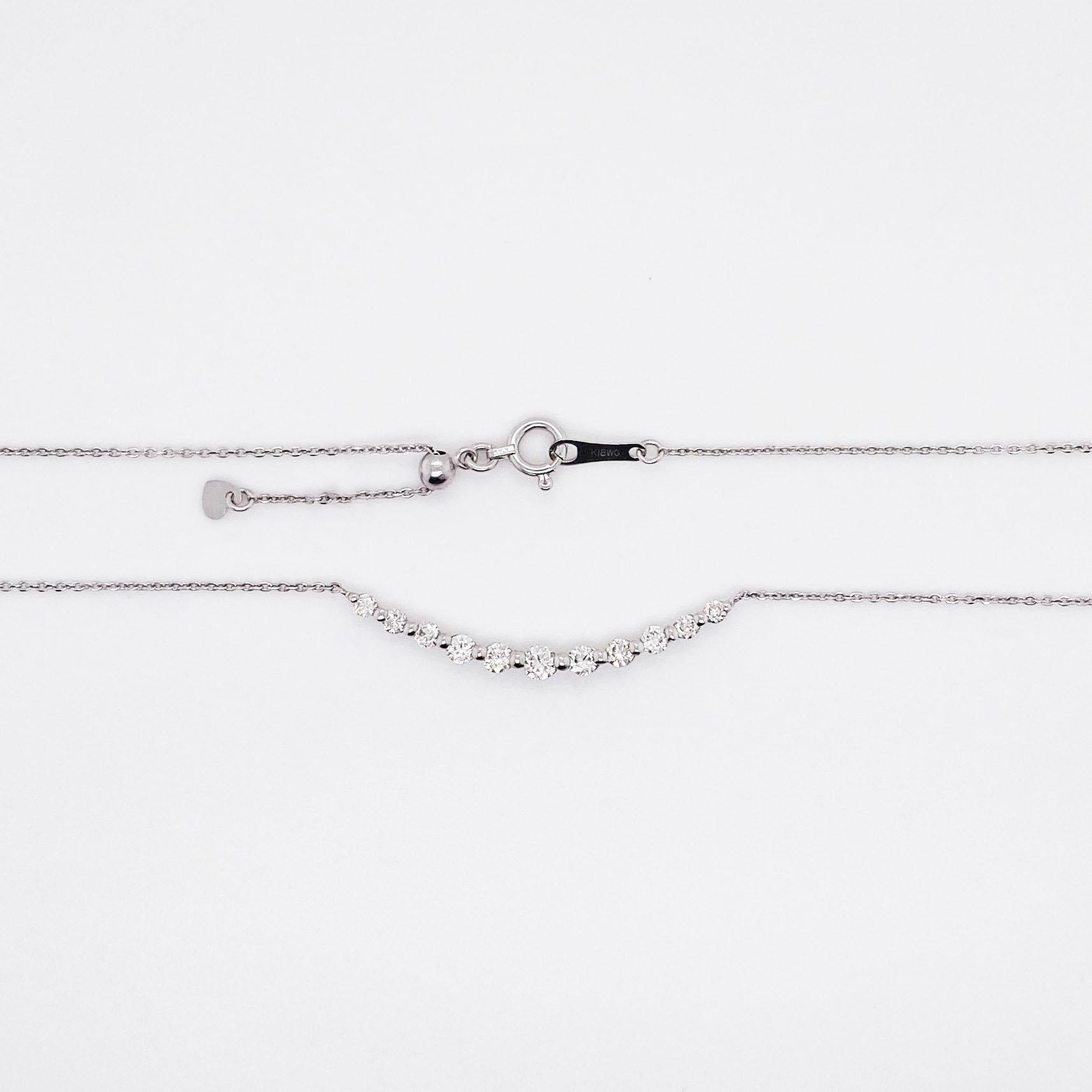 .50 carat total diamond weight (1/2 carat total) handcrafted in 18 karat white gold necklace:
This necklace is adorable and is the perfect necklace to show off eleven diamonds!  It is a simple design but will definitely make you smile.  The east to