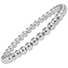 Bracciale elastico con perline in oro bianco 18 carati