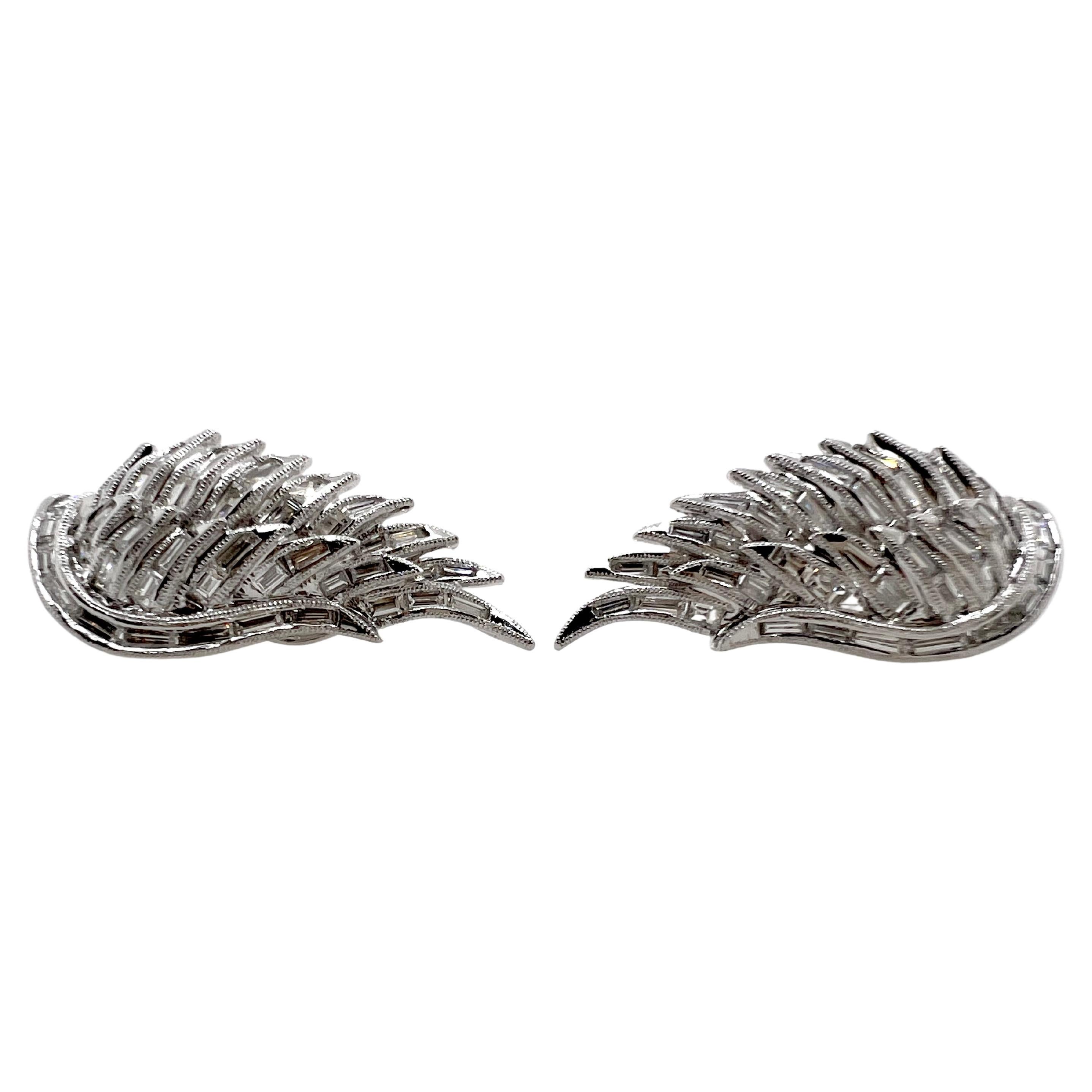 This immaculate handmade earring is comprised of baguettes and brilliant round diamonds in an angel wing shape.  The meticulous details in this piece is breathtaking and these earrings will gain everyone's attention!


Diamonds: 2.34 cts,