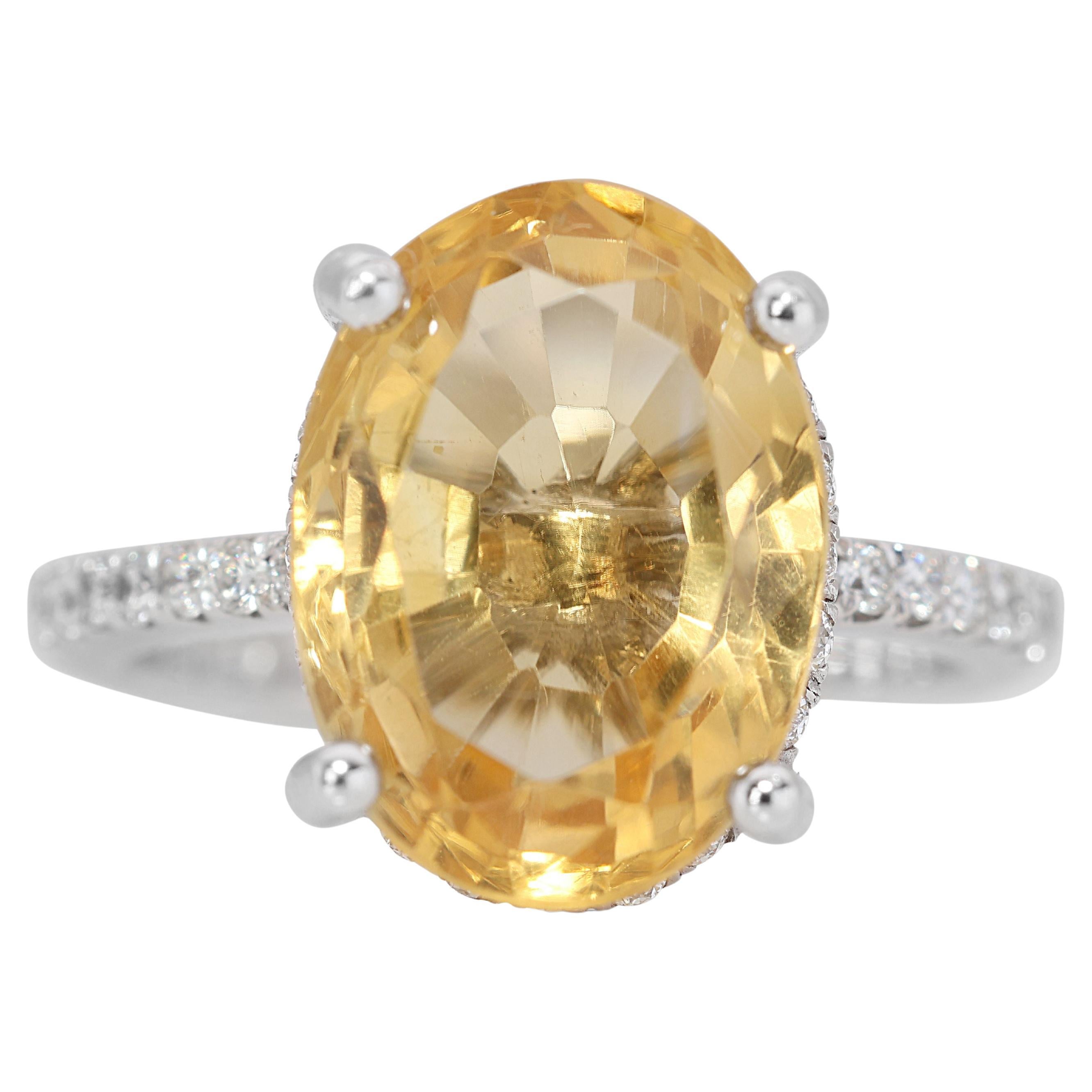18 Karat Weißgold Ring mit wunderschönem gelbem Stein mit seitlichen Diamanten