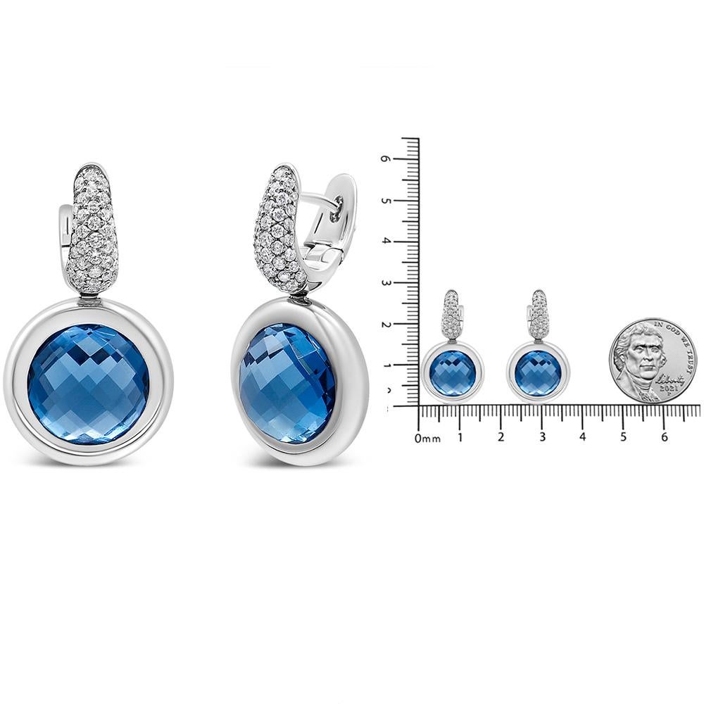 Round Cut 18K White Gold Bezel Set Blue Topaz and 1/2 Carat Diamond Bale Dangle Earrings For Sale
