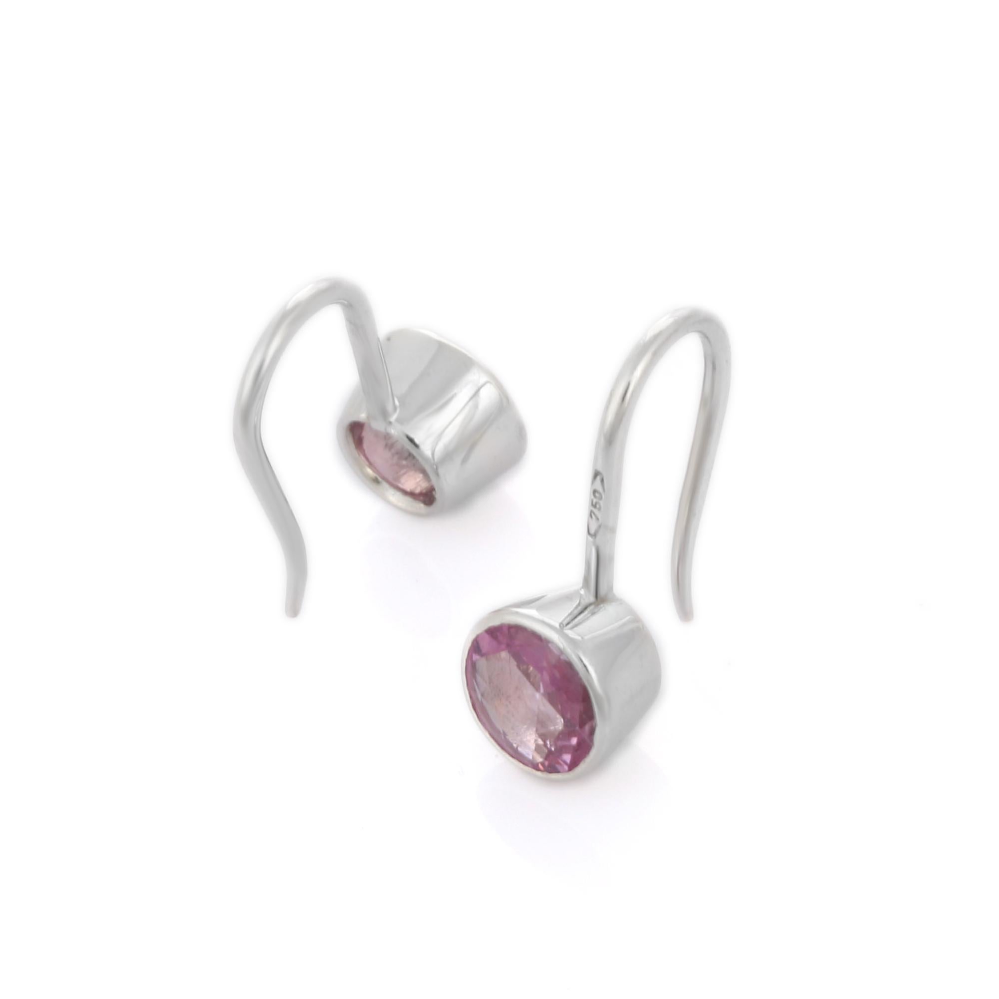 Modern 18K White Gold Bezel Set Round Shaped Pink Sapphire Dangle Earrings For Sale