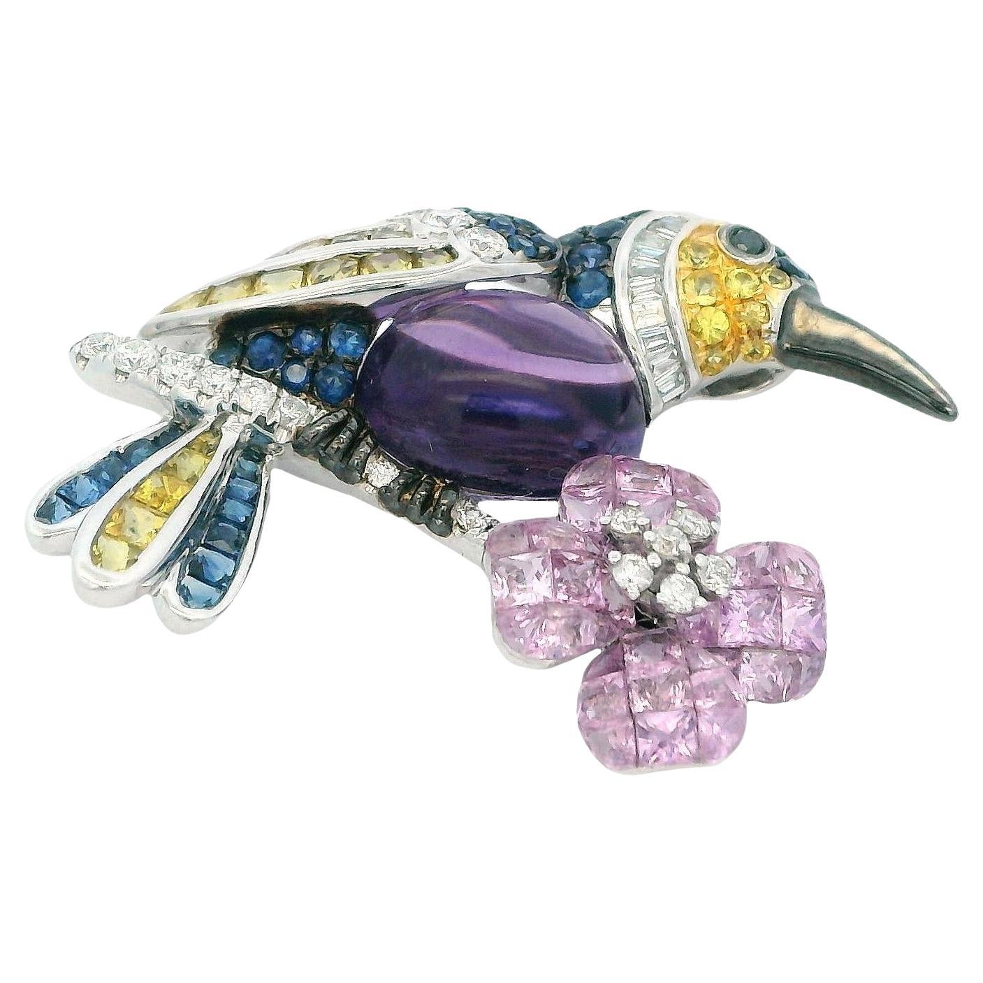 Broche oiseau en or blanc 18K avec saphir, diamant et améthyste centrée