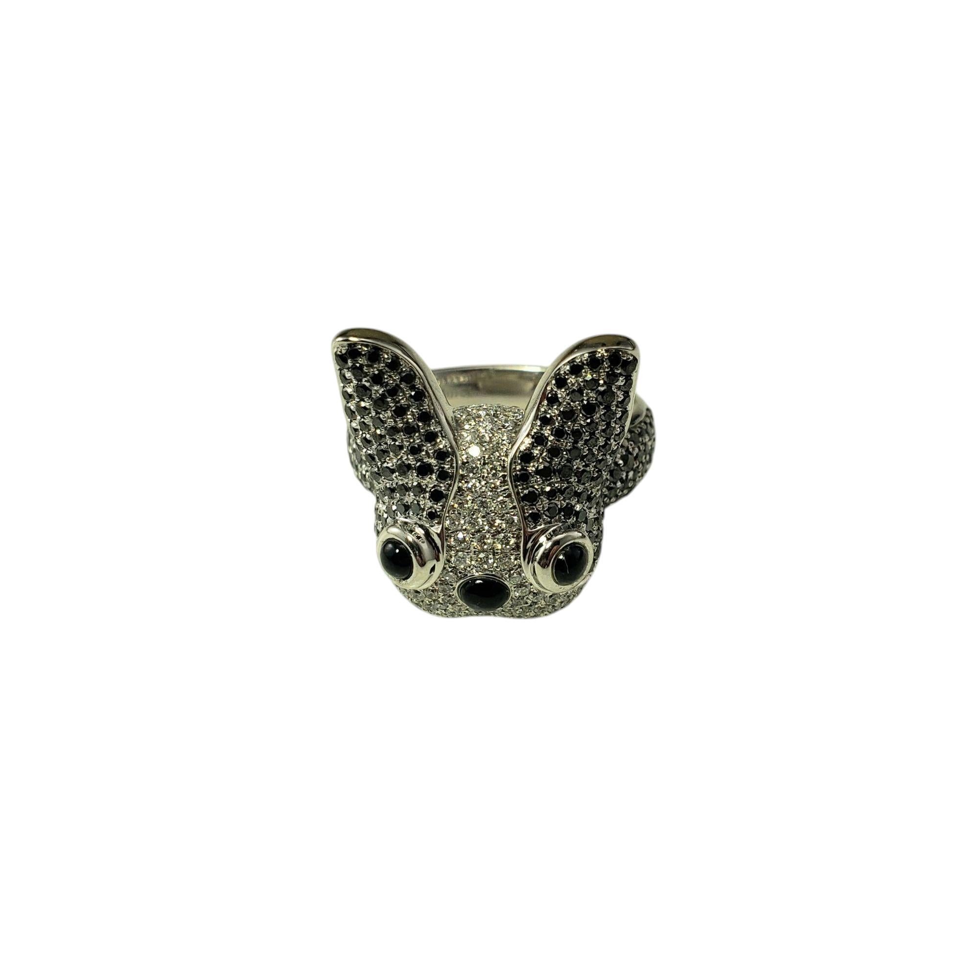 18K White Gold Black and White Diamond French Bulldog Ring Size 7.5

A must for any Frenchie lover!

This stunning 18K white gold ring features a 3D French bulldog, meticulously detailed to capture the breed's distinctive characteristics. The black
