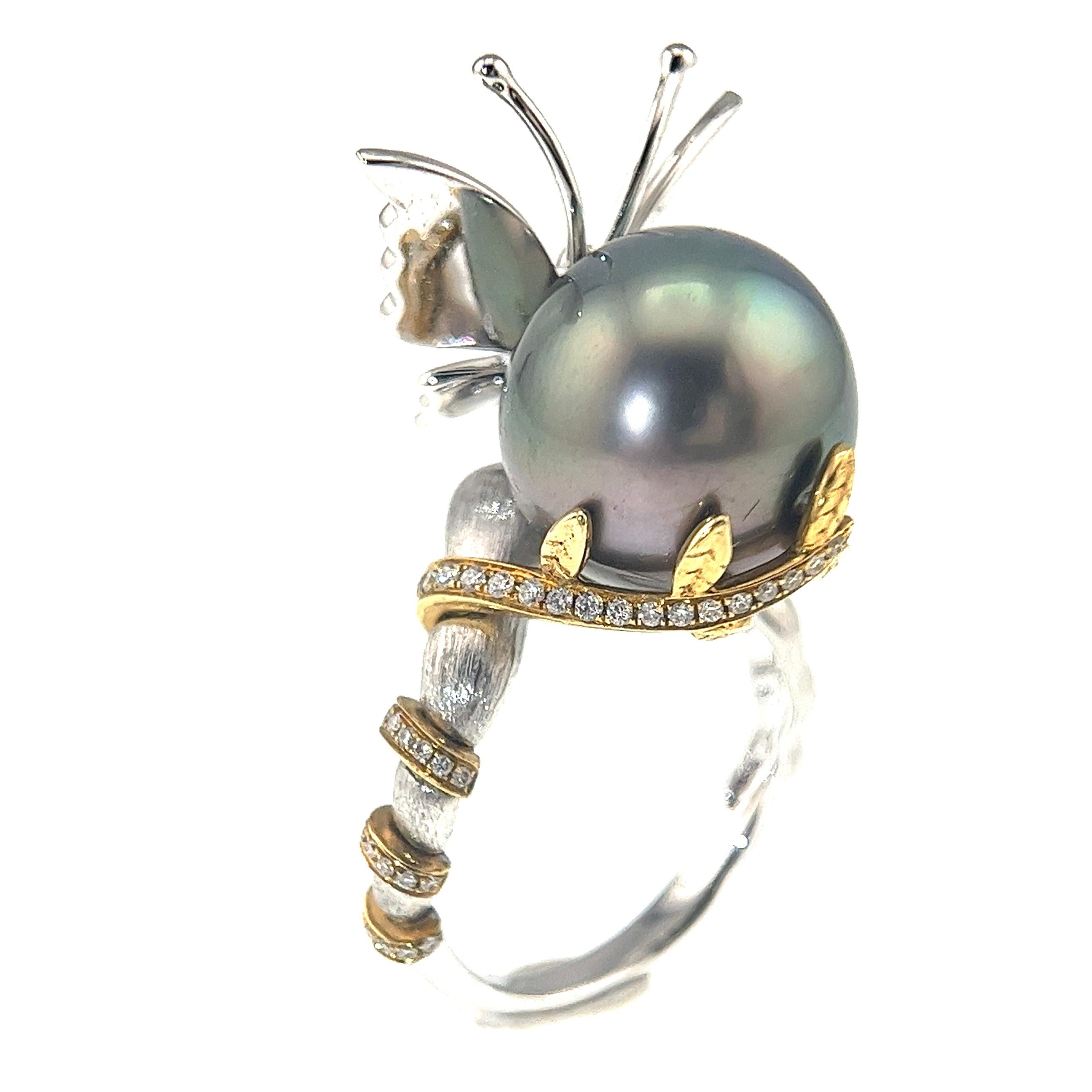 18K White Gold Black Pearl & Diamond Butterfly Ring

108 Diamonds - 0.417 CT
Black Pearl - 13.2MM
18K White & Rose Gold
Total Weight - 9.34 GM

Crafted with the finest 18K white gold, this exquisite ring captivates with its harmonious blend of the