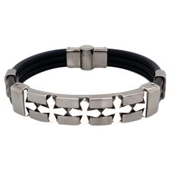 Pulsera motivo cruz de oro blanco de 18 quilates y rodio negro