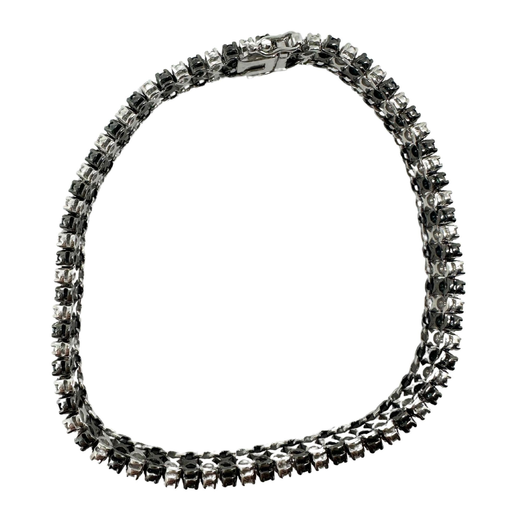 18k White Gold Blue and White Diamond Bracelet 
Condition: In good condition with some minor surface wear consistent with age.
Length: 7 inches long
Metal: 18k White Gold
Weight: 15.91 grams
Blue Diamonds: 2.17 carats
White Diamonds: 1.95 carats