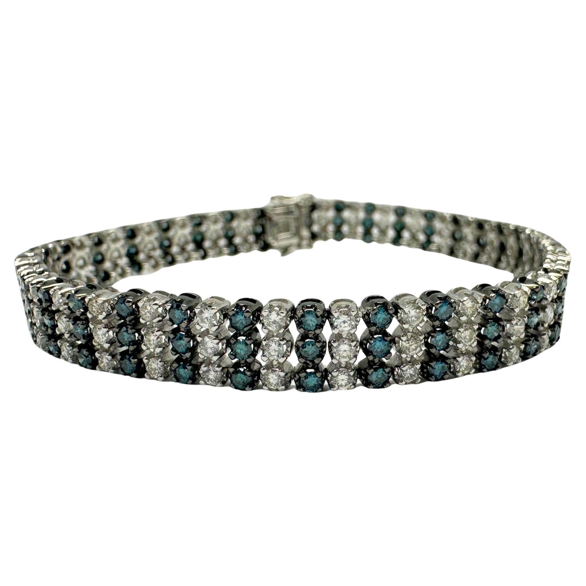 Bracelet en or blanc 18k avec diamants bleus et blancs