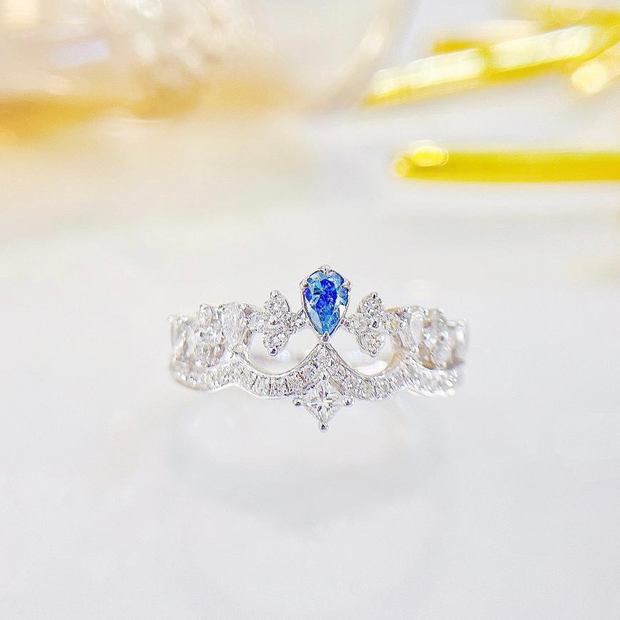 Pear Cut 18K White Gold Blue Diamond Crown Ring with Diamonds For Sale