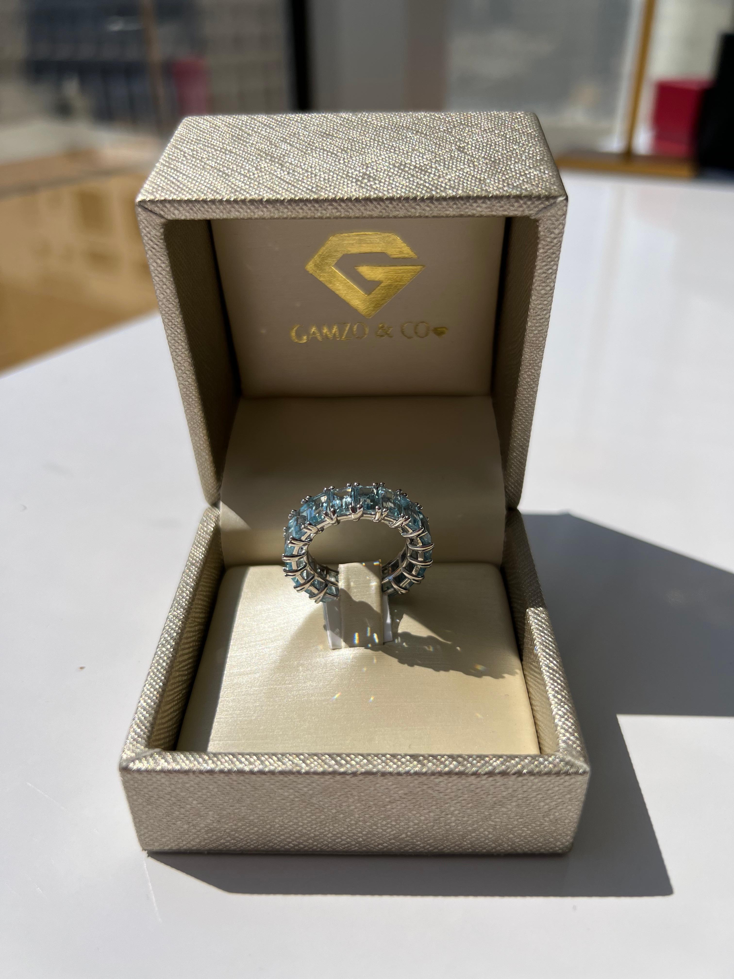 For Sale:  18k White Gold Blue Emerald Cut Topaz Eternity Ring 2