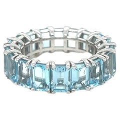 18k White Gold Blue Emerald Cut Topaz Eternity Ring