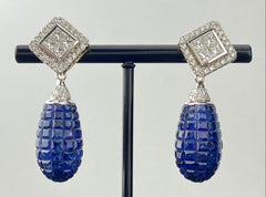 Boucles d'oreilles pendantes en or blanc 18K saphir bleu et diamant