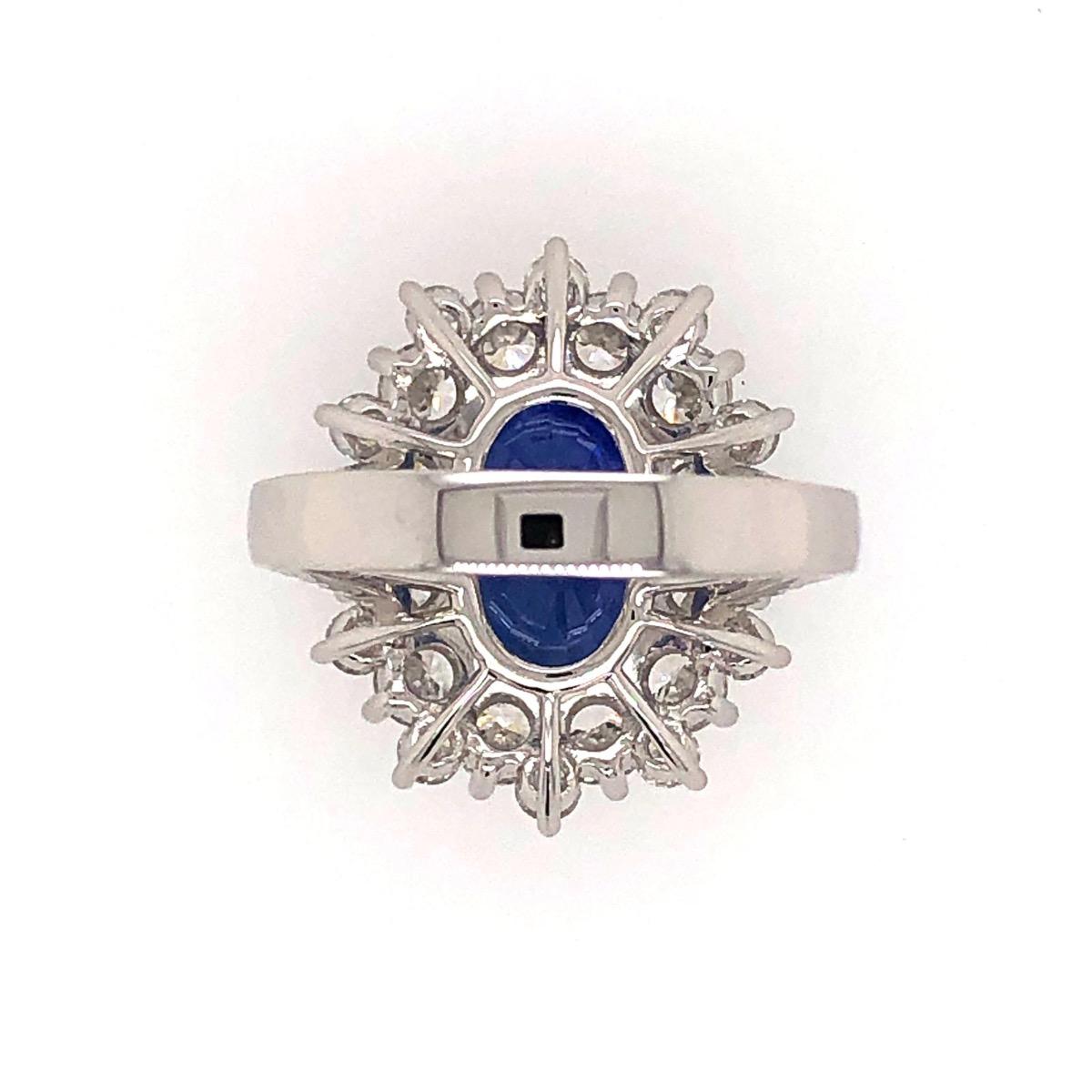 Style: Blue Sapphire Ring with White Diamonds and Diamond on the Shanks 

Metal type:  18kt White Gold 

1 7.03ct Blue Oval Sapphire 

52 total 2.79ct Radiant White Diamonds  
  
Location Of Stone: Madagascar   

Has 1 CDC Certificate. CDC Number: