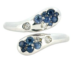Anello a serpente con zaffiro blu e diamante in oro bianco 18 carati