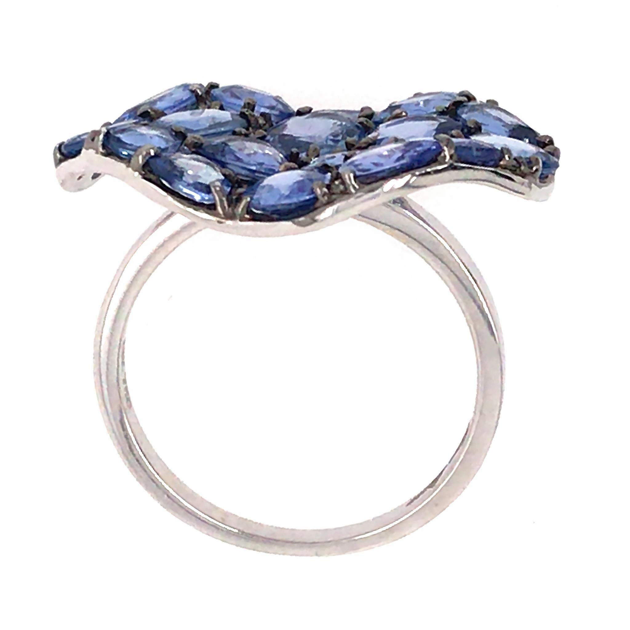 18k White Gold
Diamond: 0.02 ct twd
Blue Sapphire: 5.42 tcw
Ring Size: 7.25
Total Weight: 5.6 grams