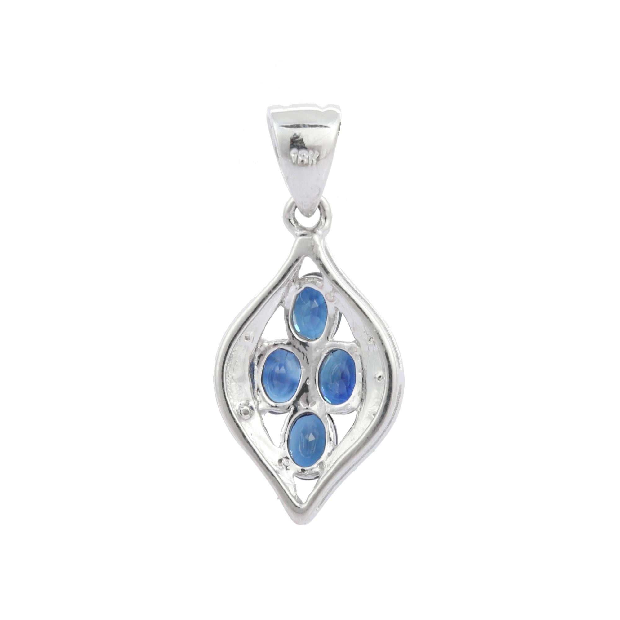 Modern 18K White Gold Deep Blue Sapphire Leaf Pendant with Diamonds For Sale