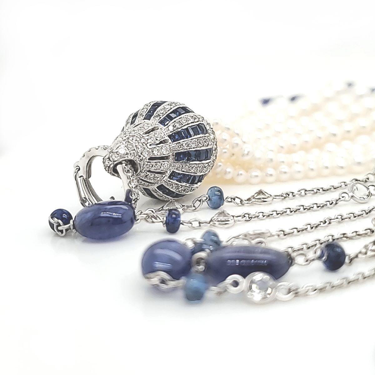 Contemporary 18k White Gold Blue Sapphire Cts 32.42 Tanzanite with Diamond and Pearl Tassel  For Sale