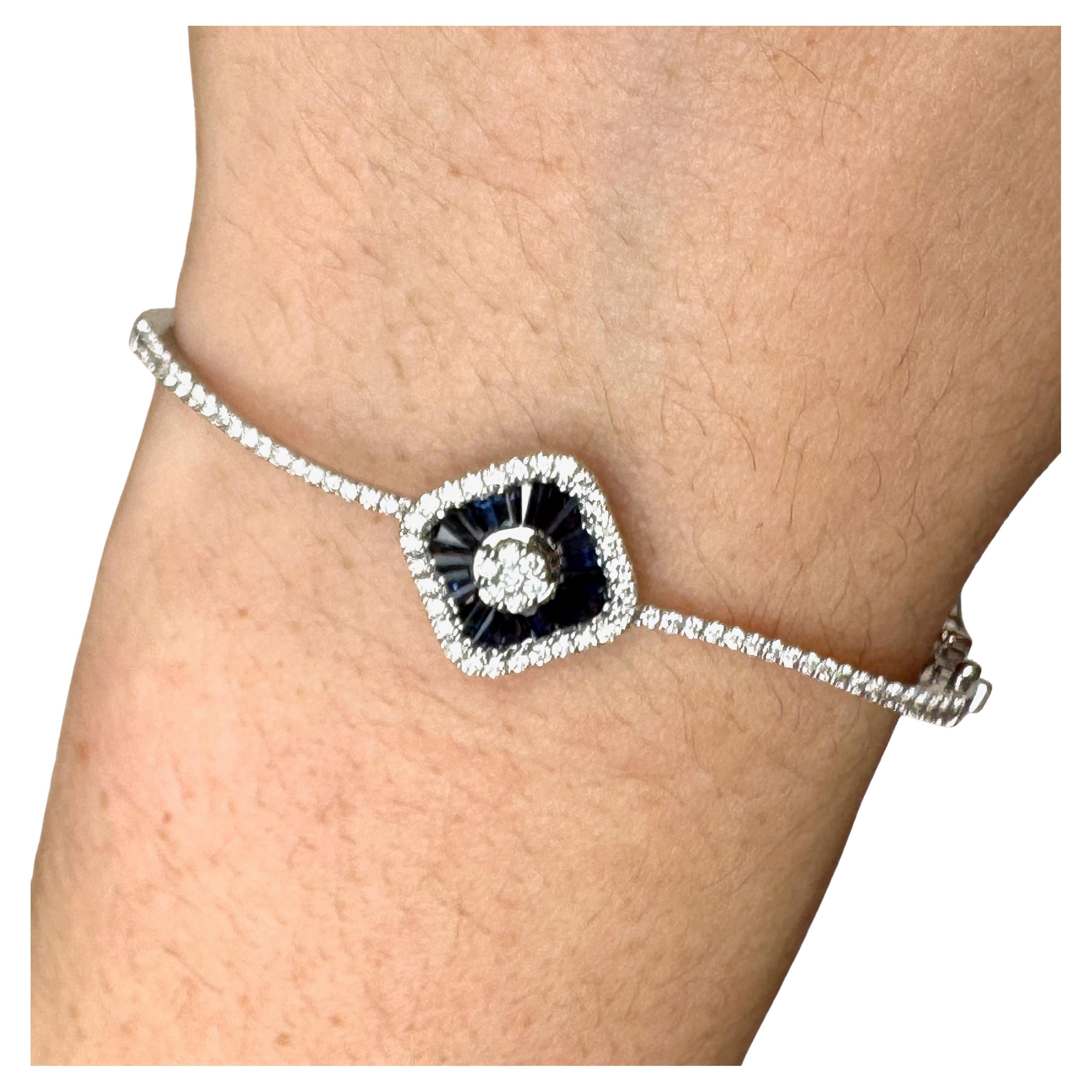 Contemporary 18K White Gold Blue Sapphire Diamond Bangle Bracelet For Sale