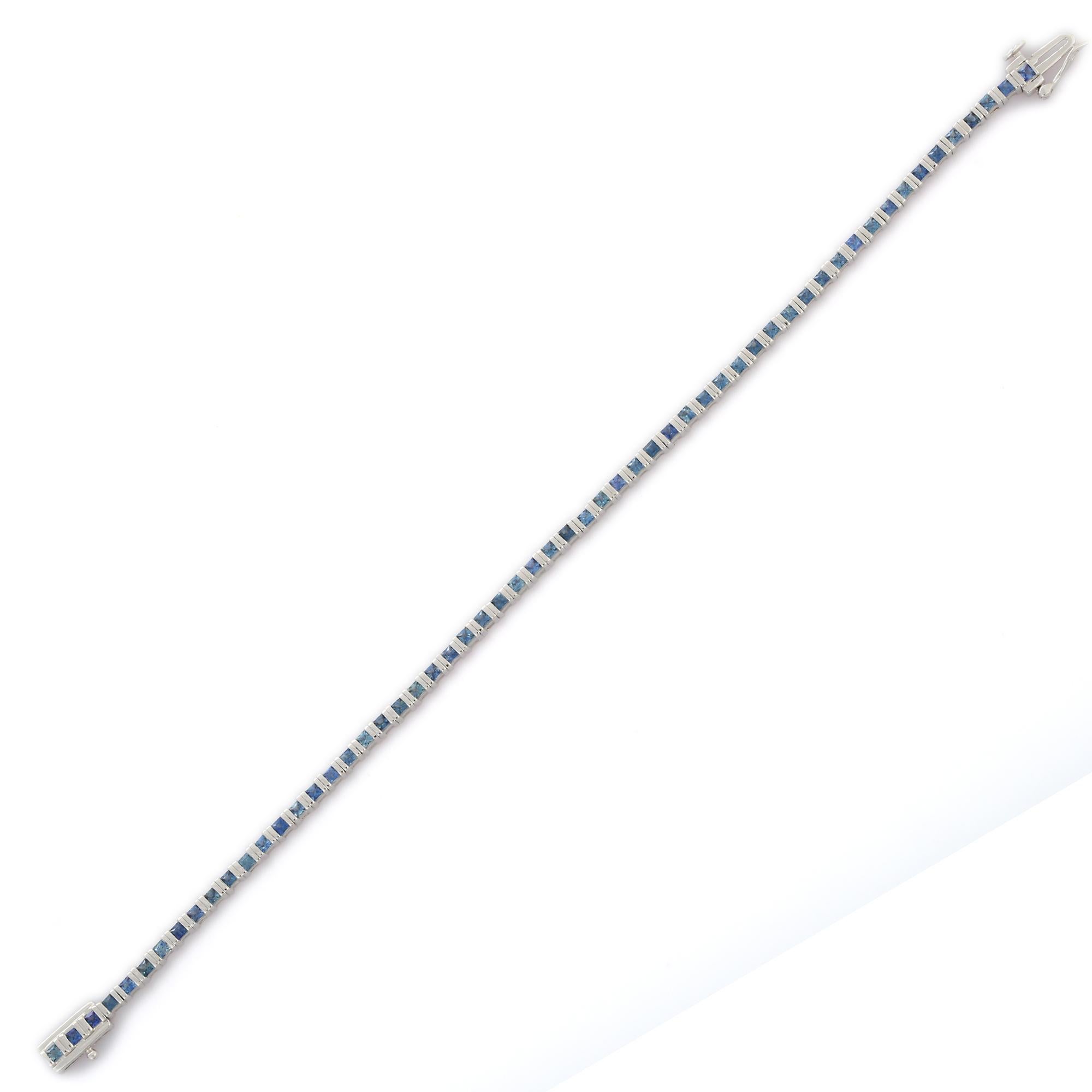 Modern 18K White Gold Blue Sapphire Tennis Bracelet For Sale