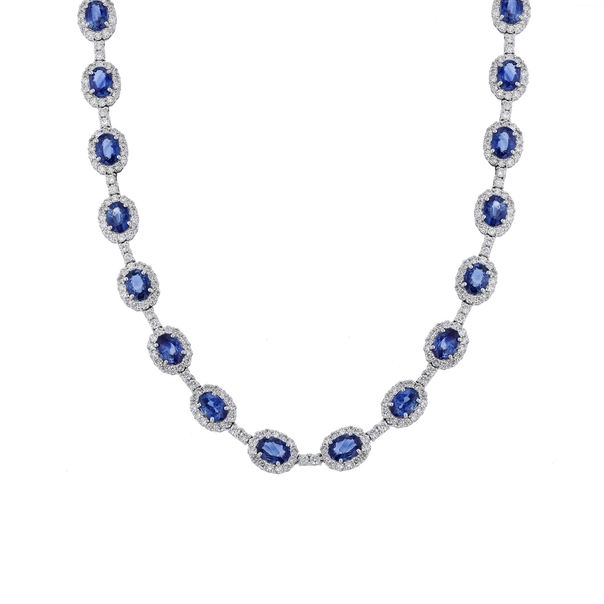 This necklace is made in 18K white gold and features an 27 oval blue sapphires weighing 27.05 carat. Surrounded by 434 round cut diamonds. Diamonds weighing 10.60 carats combined.  Necklace has a color grade (H). and clarity grade (SI2). All stones