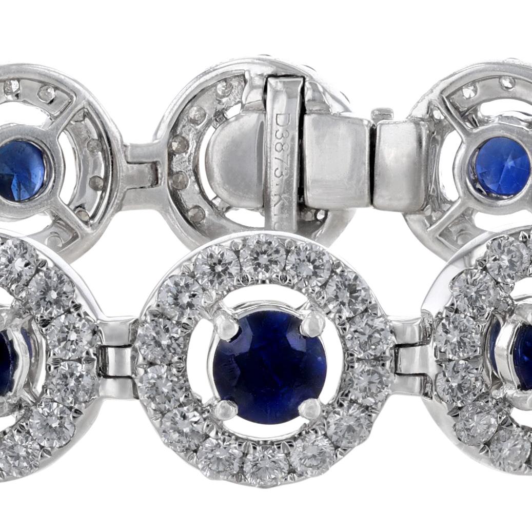 Contemporary 18K White Gold Blue Sapphire Diamond Halo Bracelet, 8.55 Carat For Sale
