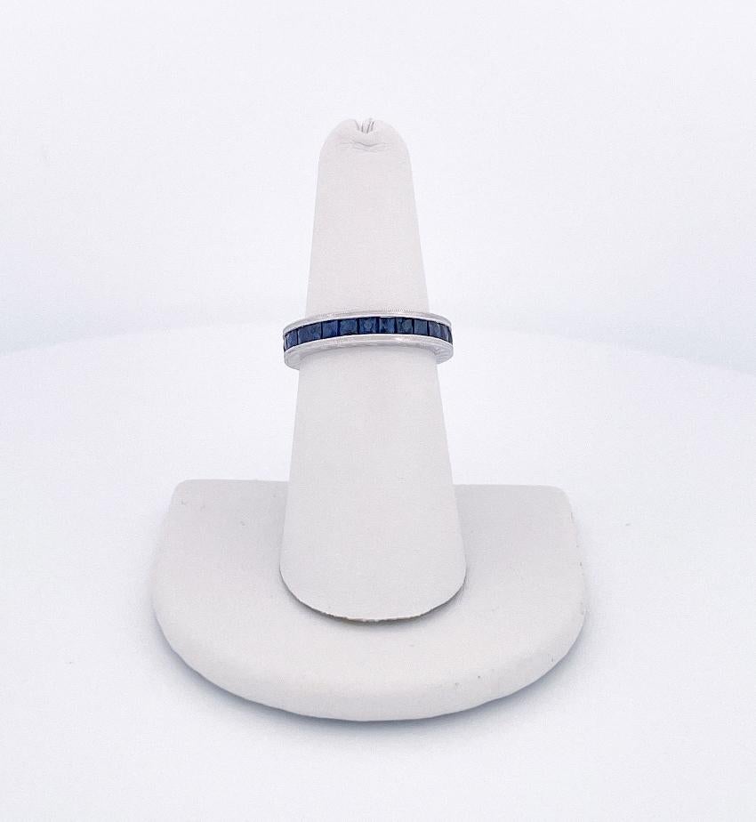 Modern 18k White Gold Blue Sapphire Eternity Ring For Sale