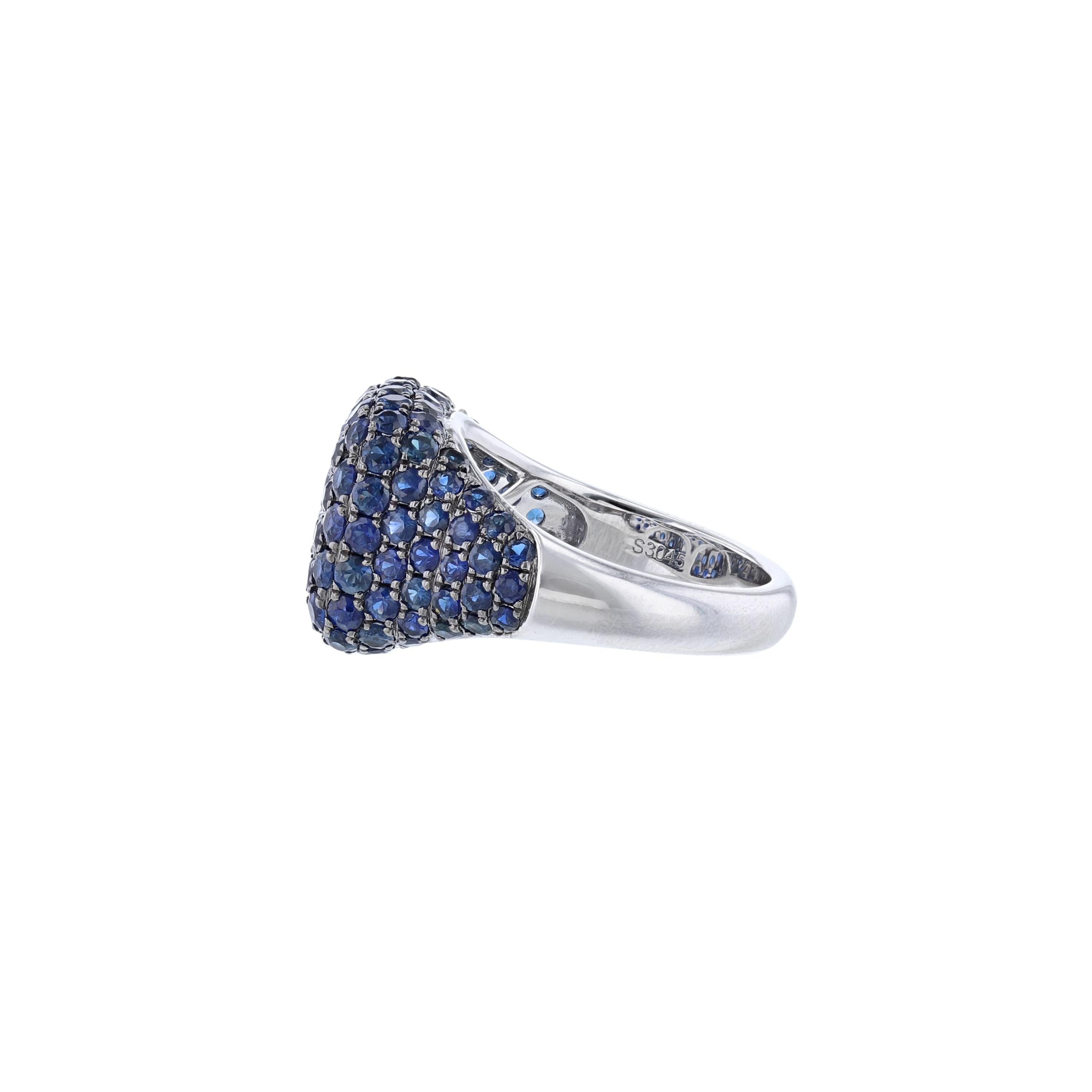 This ring is made in 18k white gold and features 114 blue sapphires weighing 3.05 carats.  Sapphires are pave’ set. With a color grade (H).
