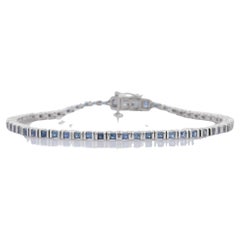 Bracciale tennis con zaffiro blu in oro bianco 18 carati